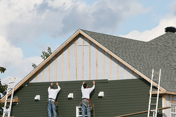 Professional Emergency Siding Repair technician working in Slovan, PA